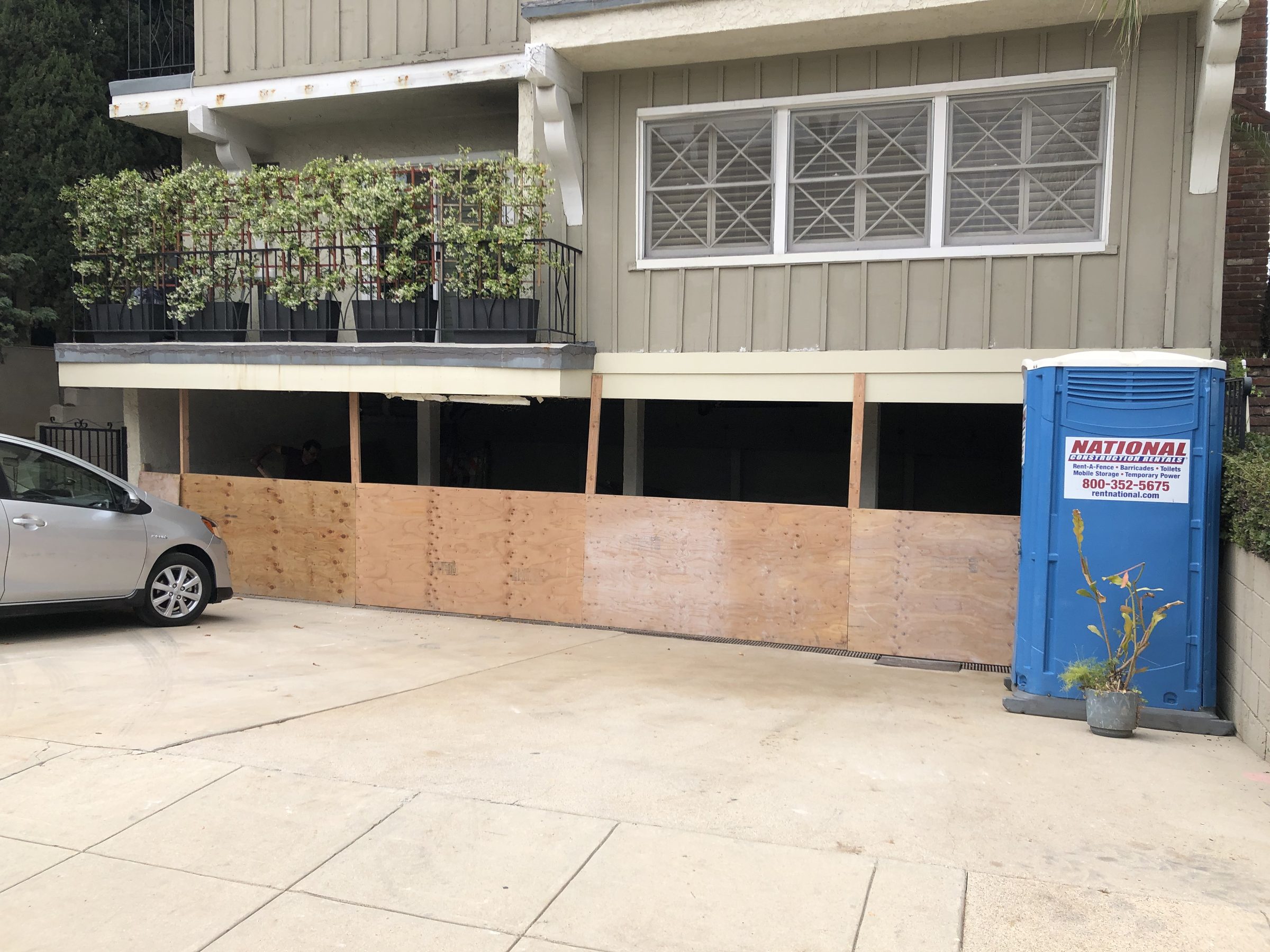 Plywood hoarding up โ construction underway in parking level