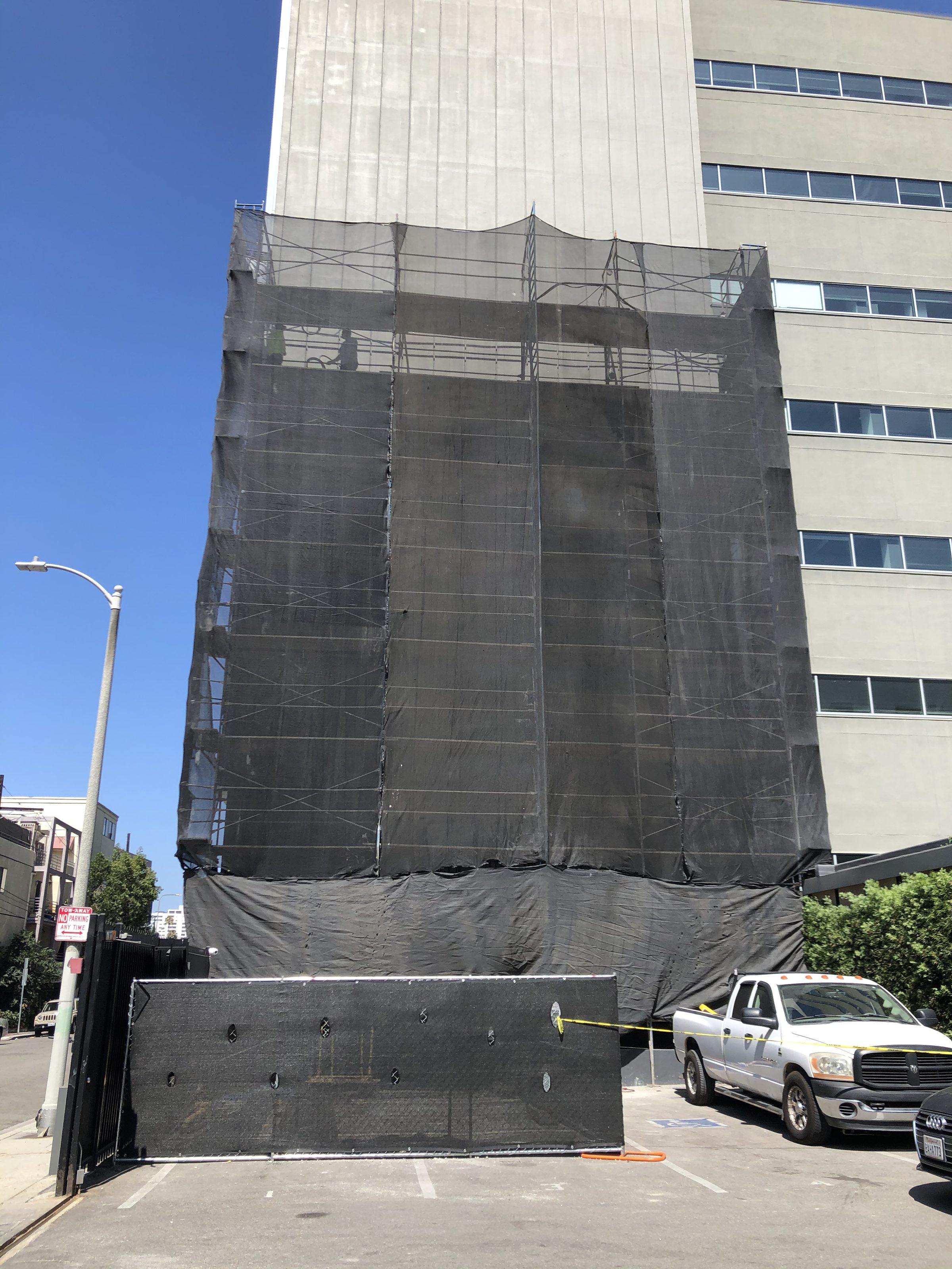 Scaffolding and debris netting — full building side