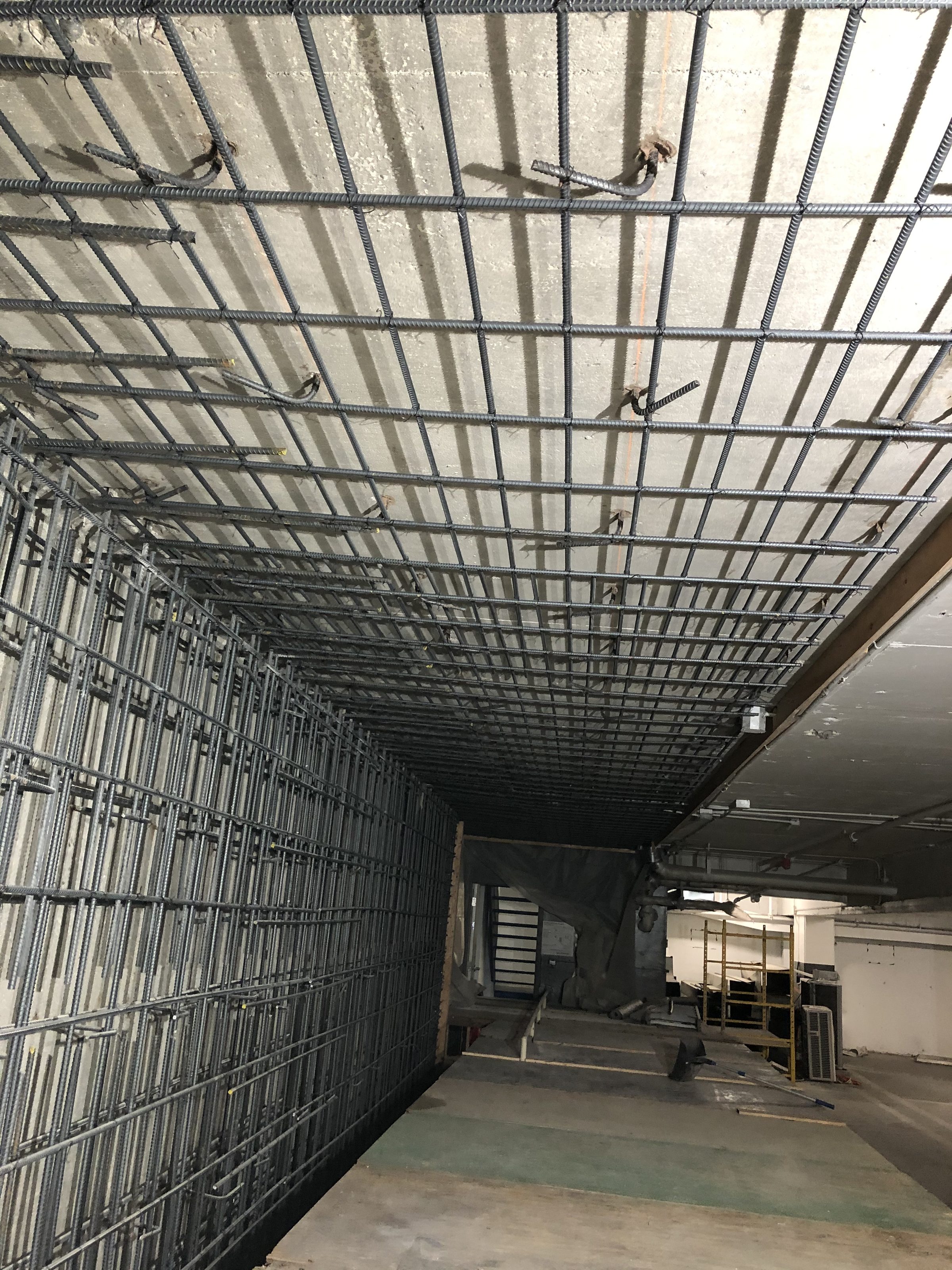 Rebar grid — wall and slab reinforcement tunnel view