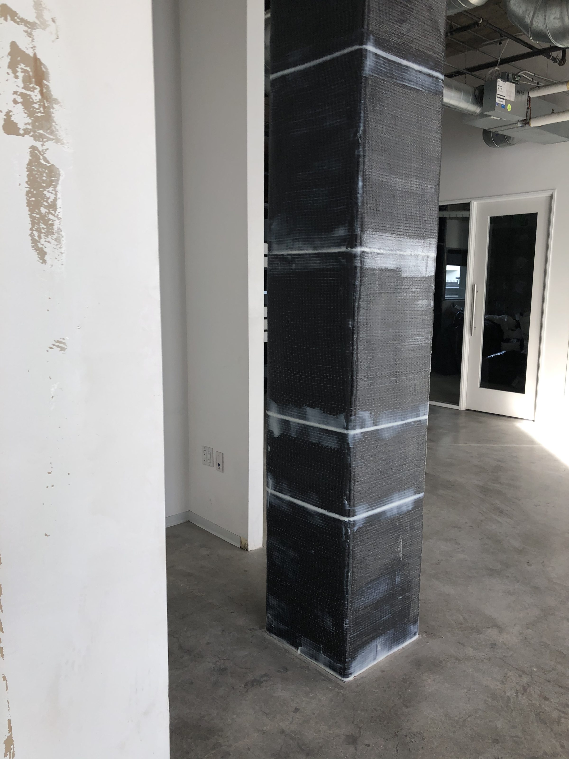 Carbon fiber column wrap — interior ground floor