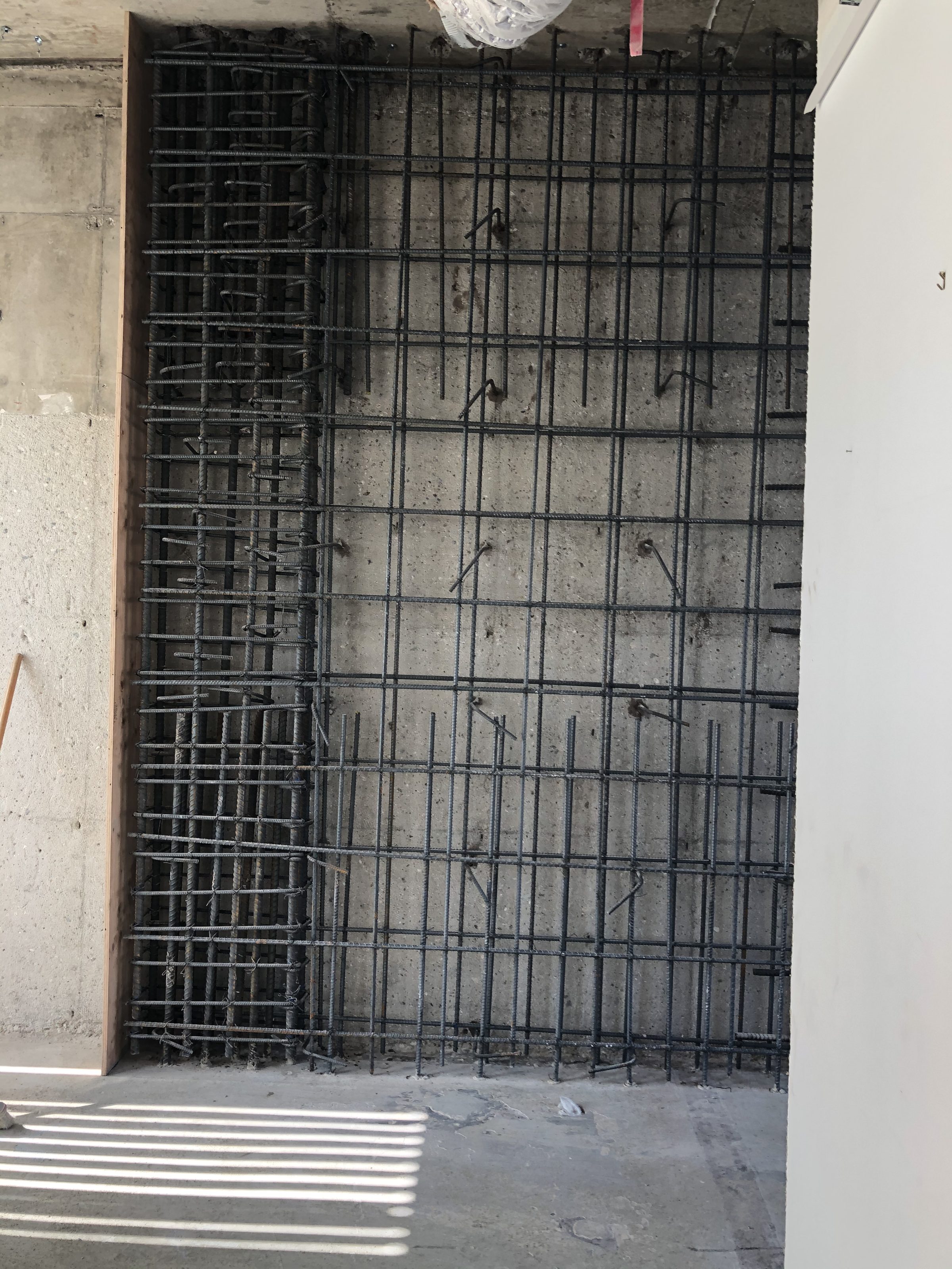 Rebar shear wall — interior framing in progress