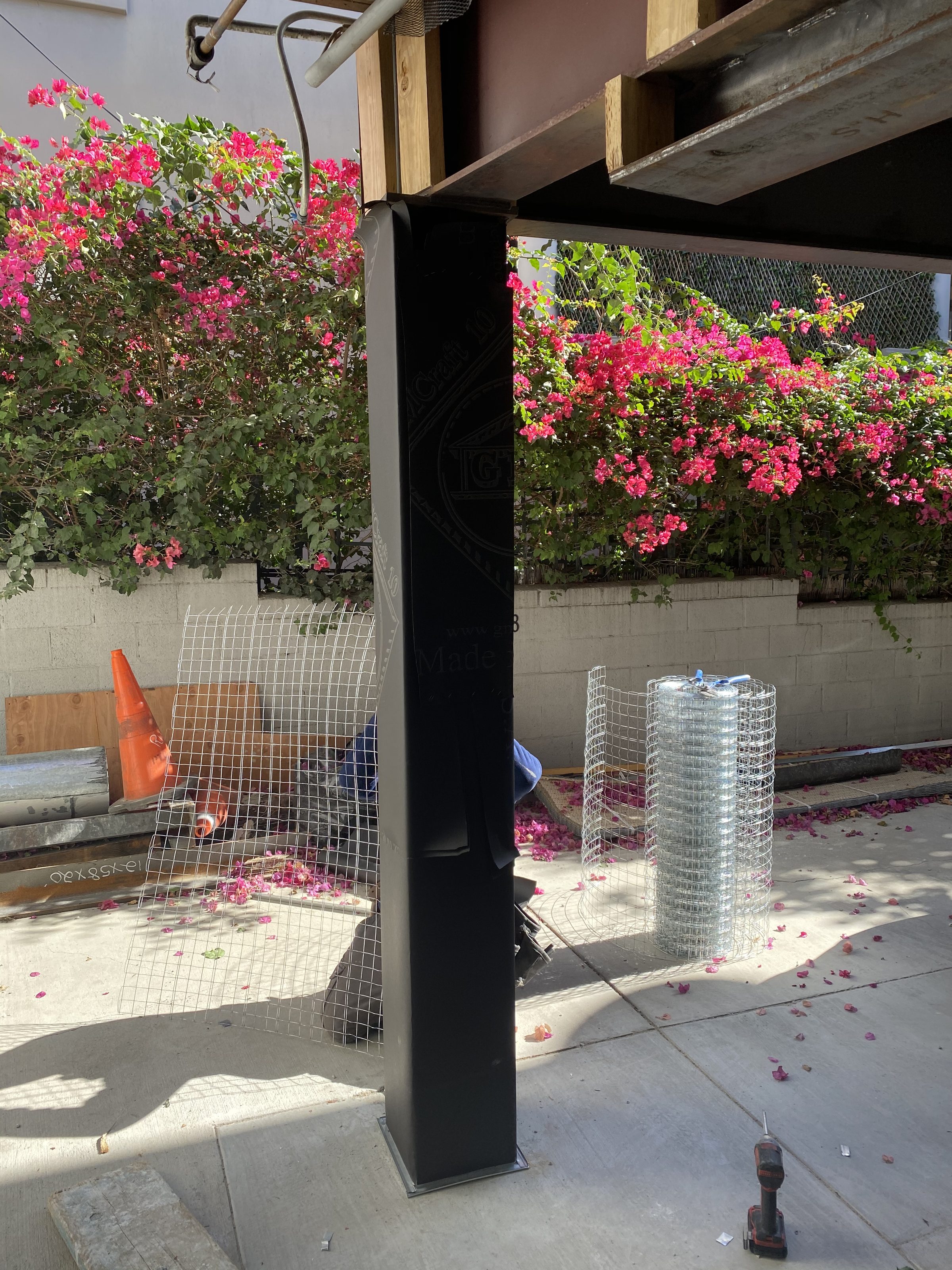 Steel column installation โ bougainvillea courtyard