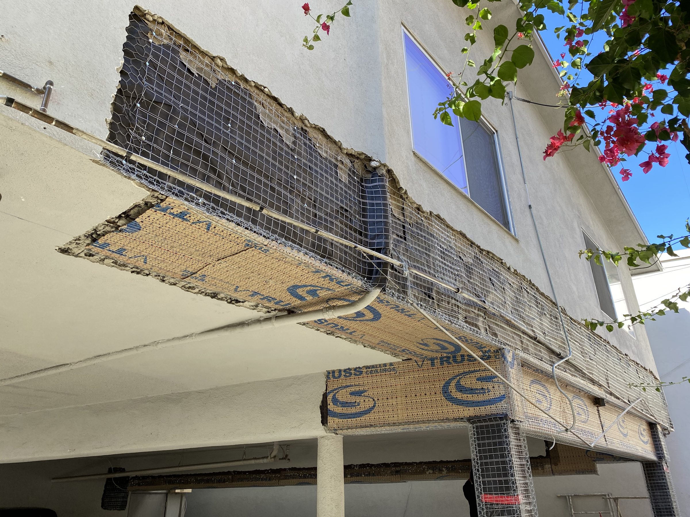 Soffit framing and lath โ steel beam enclosure in progress