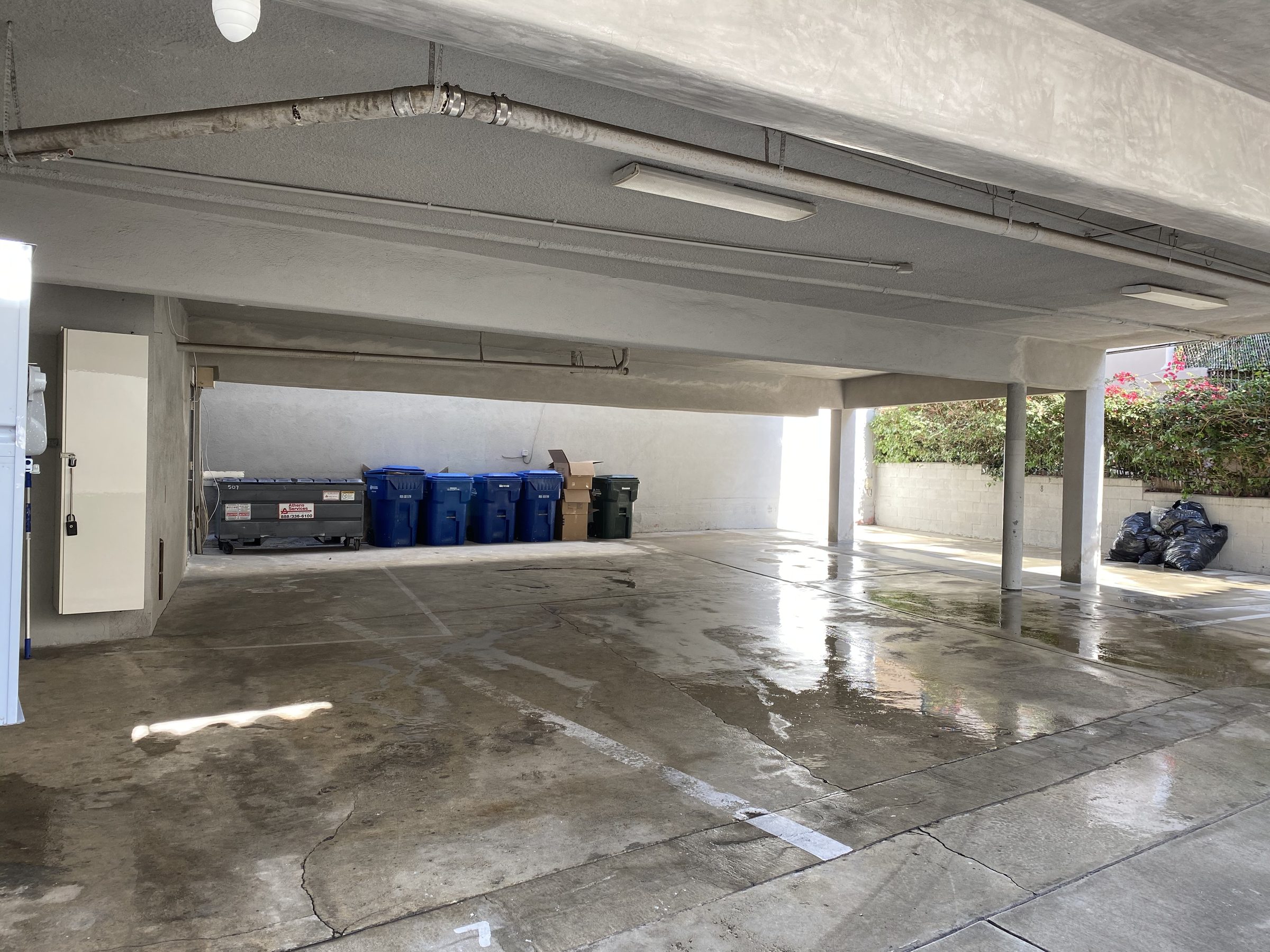 Completed parking level โ new stucco columns and beam