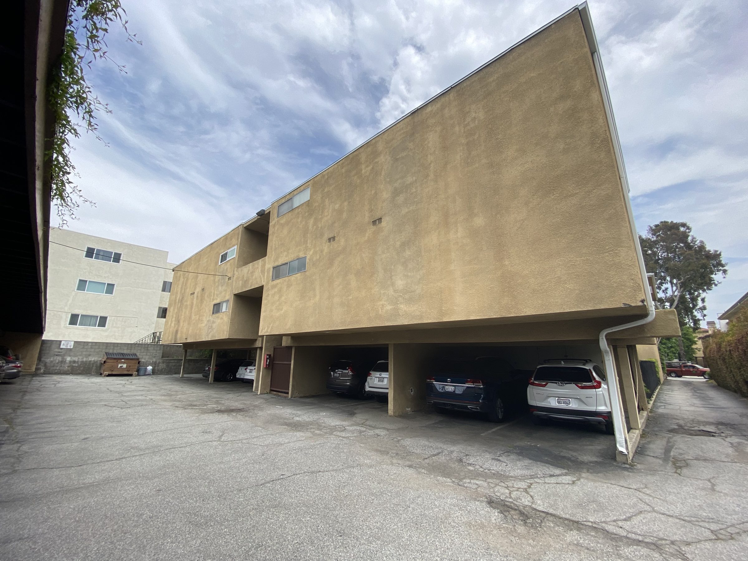 Existing building โ tuck-under parking soft-story condition